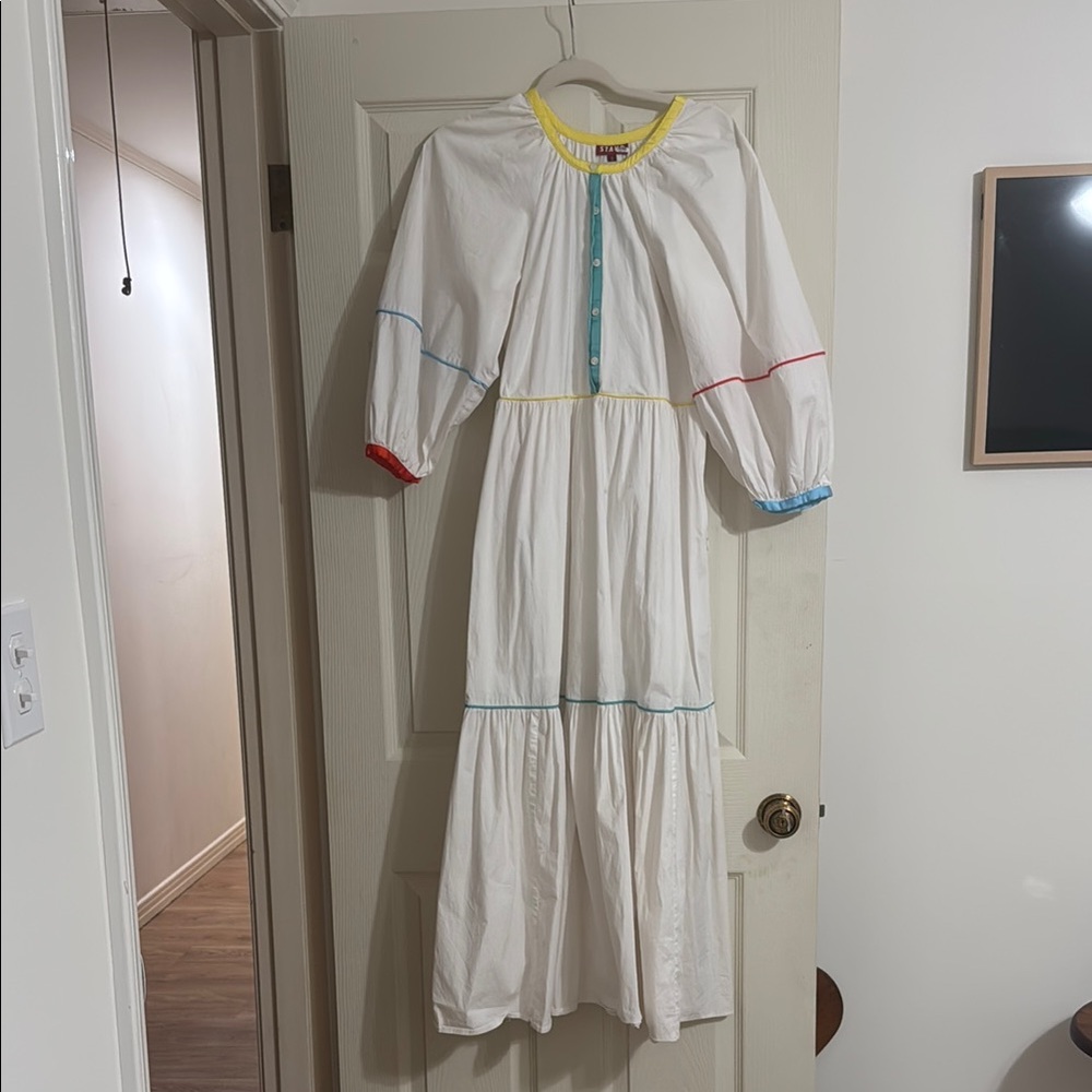 STAUD White Gown with Bishop Sleeves and Red Accents